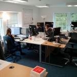 Colleagues at desks